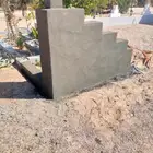 معلم مباني لباسه