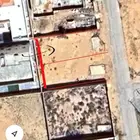 للبيع أرض في قصيباء عليها فسح بناء