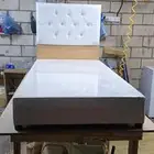 سرير خشب وحديد