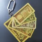 ميدالية مفاتيح قديمة بهيئة عملات الملك خالد بكامل فئاتها ..
