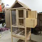 قفص مع بيت بياضه درة