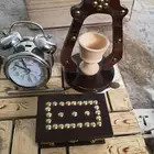 ساعة قديمه وصندوق ومبخرة تفرج