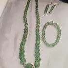 طقم نسائي من حجر الزمرد الزامبي