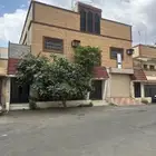 عمارة للبيع في شارع الملك فهد حي الشرفية