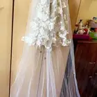 حذاء عروسة وطرحة عروسة وجيبون كلها جديدة