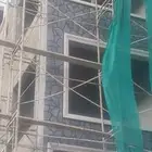 بوكلين و قلاب ل بناءحجر بجميع انواعة وقص وردم الأراضي وطر