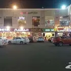 مكاتب ادارية ومحلات منوعة بمركز اللجين التجاري بالحزام