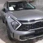 كيا سبورتاج لارج الفل الكامل موديل 2025 الجبر داخلي احمر