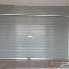 تصنيع وتركيب أبواب الجراجات والمحلات