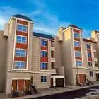 للبيع شقه دور ثاني مصعد راكب جاهز مقابل كبري المطار من550الف