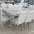 طاولة طعام رخام ملكي أرجل ستيل فضي