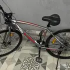 سيكل رياضي تعاشيق هجين مقاس 26 على اعلى سوم