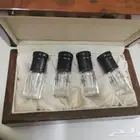 صندوق خشبي مع 4 أرباع اوقية