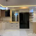 تفصيل مطابخ خشب ودواليب ملابس ومطابخ صاج والمنيوم