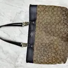 شنطة كوتش الاصلية