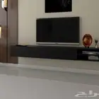 ع طاولة تلفزيون شاملة الرف
