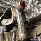 مصباح كشاف نمط عسكري قديم على شكل L