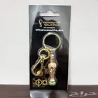 مجسم صغير كأس العالم تذكاري بهيئة ميدالية مفاتيح Qatar 2022