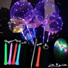 العيد بالونات مضيئة ومنفاخ كهربائي