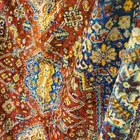 مفرشة قديمة كبيرة نسبيا على هيئة سجاجيد الصلاة القديمة