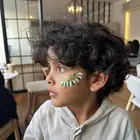 رسم على الوجه لاحتفالات اليوم الوطني