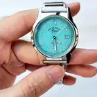ساعة ام صليب الاصلية القديمة لون تيفاني ب الف ريال