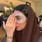 رسم على الوجه بيوم الوطني