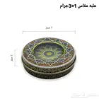 علب الزعفران فارغه ونجر