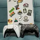 Playstation 5 with 2 controllers and 4 CDs