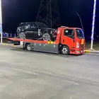 سطحة داخل بريدة لنقل السيارات