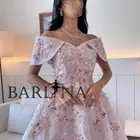فستان سهره وردي بأكتاف مكشوفه مزينه بورود
