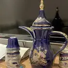 دلة مع فناجيل خزف ياباني