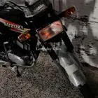 AX100