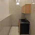 شقة في حى البيان غرفه وصاله وركن مطبخ وحمام