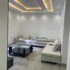 كنب شبه جديد وطاوله