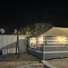 مخيم في الصفر يتكون من مجلس بيت شعر ومطبخ ودورت مياه وجلسه