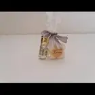 شمع مغلف مع شريطة للمواليد أو توزيعات حسب الرغبة اللون