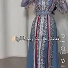 قفطان من المصممه غرام الفضلي لبسه وحدة لون ابيض وذهبي