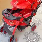 عربة أطفال وجلاسه