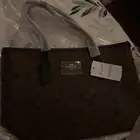 شنطة كوتش لون بني
