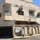 للبيع عمارة شقتين في التلعة جوار المحطة بسعر مناسب