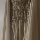 فستان سهره فخم لزواج اخ او اخت من مصممه