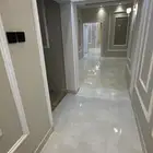 شقة دور ارضي ثلاثه مداخل من غير الفرش لم تسكن جديده