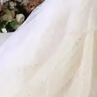 فستان زواج أبيض فاخر (مستخدم مرة واحدة فق