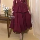 فستان من المصممة عزيزة علي