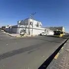 مبني دورين موقع مميز شارع تجاري