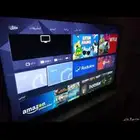 شاشة بلازمة مع طاولة