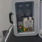 ثلاجه سياره وبيت تعمل بولاعةالسياره وكهرب بيت صغيره