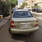 اكسنت -2001 ذهبي