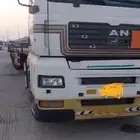 راس تريلا شاحنه مع سطحة للإيجار يومي شهري سنوي